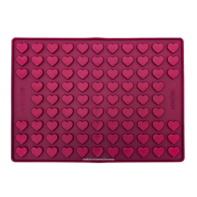 Burgundy Collory silicone baking mat for making heart-shaped homemade dog treats