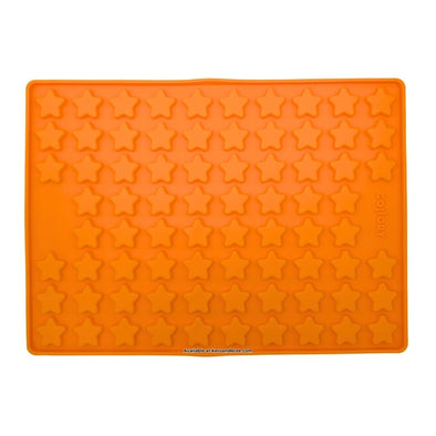 Orange Collory silicone baking mat for making star-shaped homemade dog treats